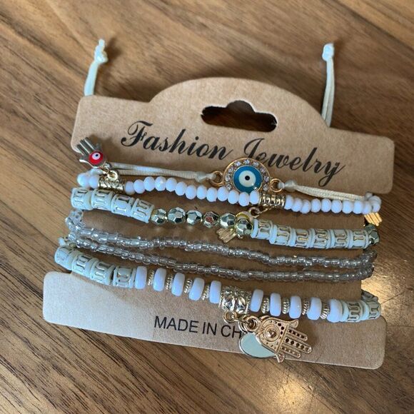 New, bundle of 3 packs of 6 strands each, beads and charms on stretch chord - Picture 6 of 15